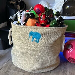 Toy basket and including a few mystery toys as a bonus
